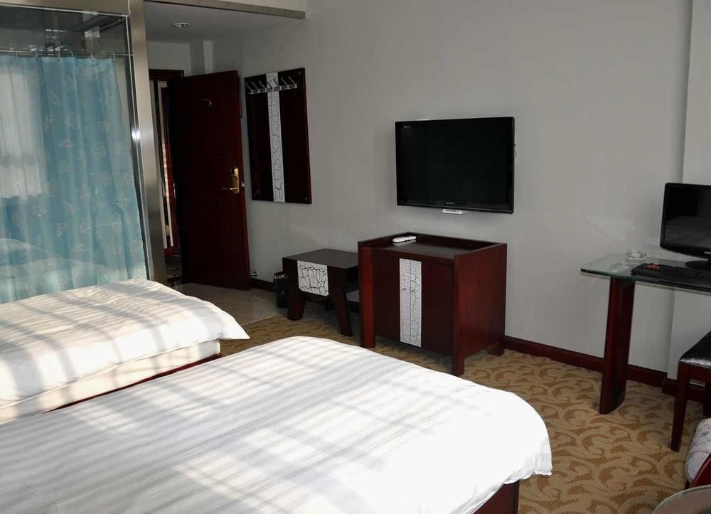 Hangjia Hotel Urumqi Bagian luar foto