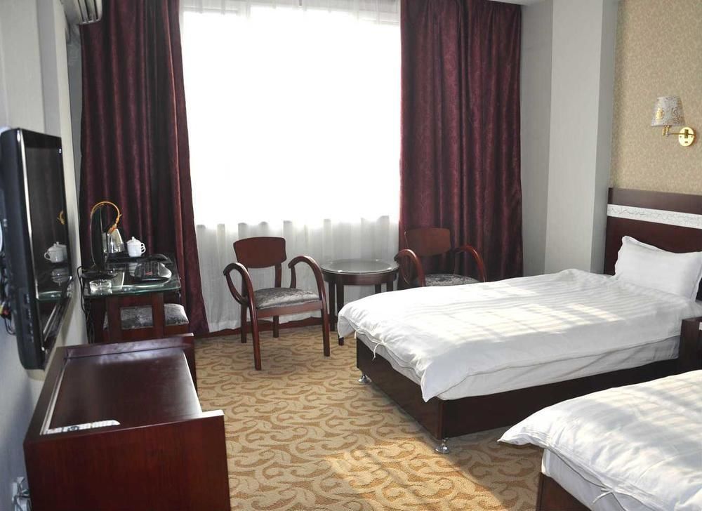 Hangjia Hotel Urumqi Bagian luar foto